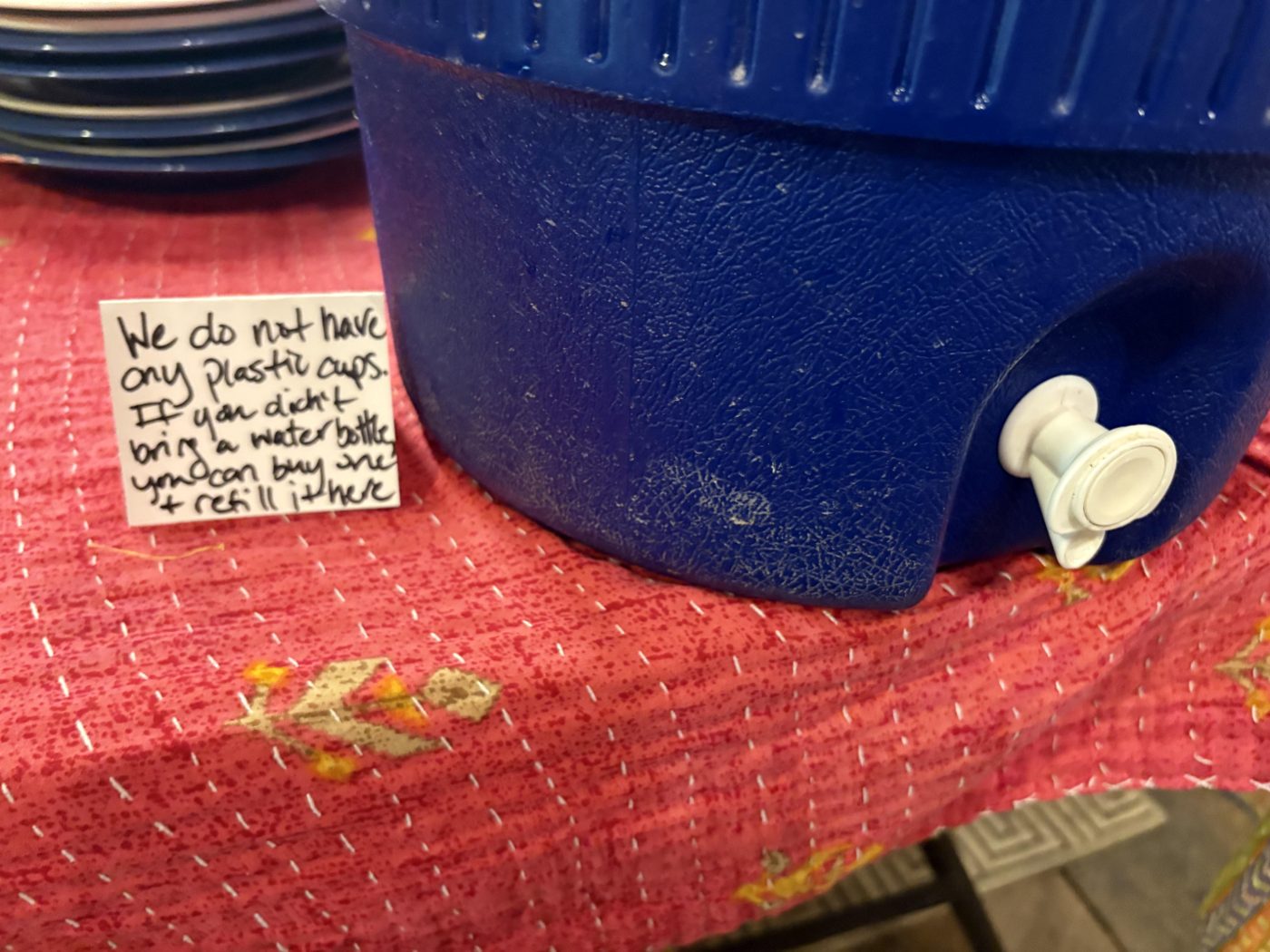 The Mercantile's water cooler. The sign says no plastic cups, so bring a bottle or buy one and refill it here.